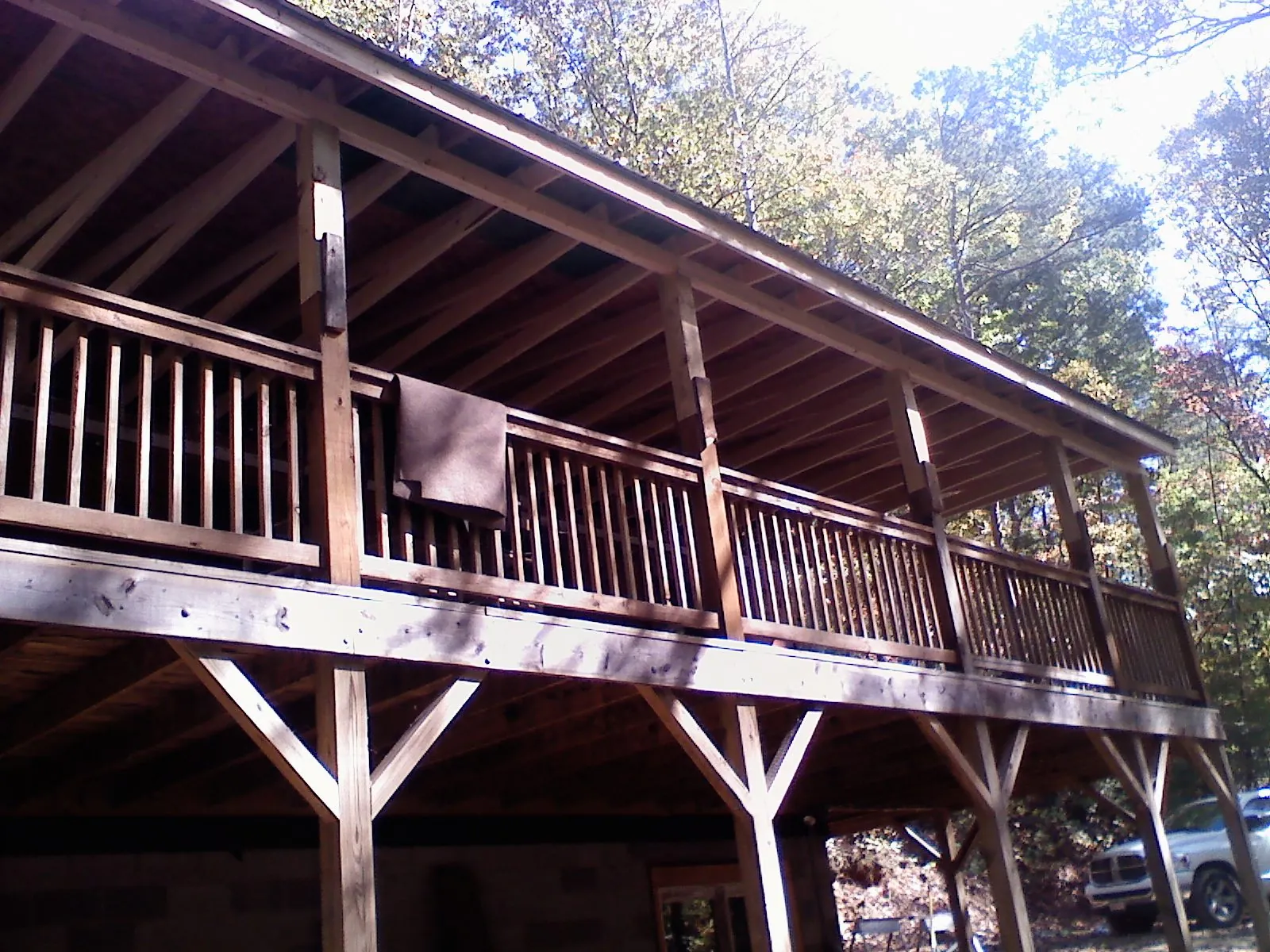 Timber framing under a new elevated porch and deck — Roof Leak Repair in Sunset Beach by Roofing Brothers
